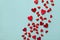 Valentine day card or banner. Many red hearts on blue background top view. Flat lay style