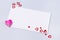 Valentine Day Composition or Mock Up White Blank Confetti in Skape of Hearts and Candy Blue Background Horizontal