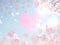 Valentine day red hearts on blue sky fluffy white clouds falling pink petals  background illustration template  copy space