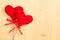 Valentine day series, decorative red hearts hanging on wood background