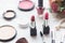 Valentine Gift. Makeup cosmetics tools background and beauty cosmetics, products and facial cosmetics package lipstick, eye shadow