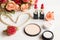 Valentine Gift. Makeup cosmetics tools background and beauty cosmetics, products and facial cosmetics package lipstick with flower