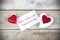 Valentine greeting card on wooden table with text Alles Liebe zum Valentinstag , written in German