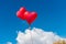 Valentine heart balloon against blue sky background