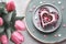 Valentine heart cake with chocolate, sugar decorations and text