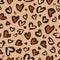 Valentine Leopard or cheetah seamless pattern. Trendy animal print. Spotted hearts imitate jaguar skin. Vector background for