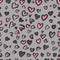 Valentine Leopard or cheetah seamless pattern. Trendy animal print. Spotted jaguar fur heart shaped. Vector background for textile