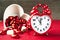 Valentine love heart shaped red love clock with sweet chocolates