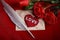 Valentine love letter, roses, quill and envelope