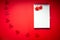 Valentine mock up with blank note on red background with hearts for your message ,copy space