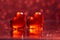 Valentine Romaance -Two luminous red hearts on a mirror bokeh background