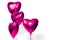 Valentine`s Day. Air balloons. Bunch of purple heart shaped helium balloons isolated on white