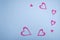 Valentine`s Day background. Frame. hearts on pastel blue background. Valentines day concept.