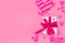 Valentine`s Day background. Gift box on pastel pink background. Valentines day concept. Copy space