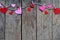 Valentine`s Day background with handmade felt hearts, clothespins. Valentine gift making, diy hobby. Romantic, love concept. Happ