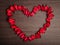 Valentine\'s Day background. . petals of red roses in the shape o