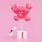 Valentine\\\'s day background, red 3d heart shaped balloons bouquet floating out of opened gift box