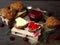 Valentine`s Day breakfast. Composition of wholegrain muffins in the form of heart with butter, cheese and jam.