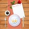 Valentine`s day breakfast with red rose and greeting card.