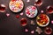 Valentine\\\'s Day celebration concept. Top view photo of heart shaped saucers with confectionery