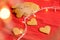 Valentine\\\'s day cinnamon cookies background isolated on red with ethereal lights. Valentine\\\'s day and love concept.