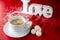 Valentine`s day. Coffee with sweets and inscriptions Love