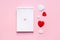 Valentine\\\'s day composition with notebook list and hearts on pink pastel background