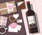 Valentine`s day composition. Valentine card, mug with coffee, cookies, gift box and wine. Top view.