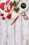 Valentine`s day composition on wooden table with heart shape objects and red rose