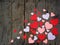 Valentine`s Day concept. Composition of paper colourful hearts on wooden background. Selective focus. Copy space