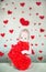 Valentine`s Day concept copy space. Little baby with kisses from lipstick. A girl with a red heart Saint Valentine. Red box with a