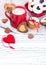 Valentine`s Day concept / red cup of coffee and biscuits shaped