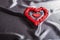 Valentine\'s day concept, red hearts Love on silk gray background