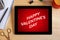 Valentine`s day concept on tablet screen with office objects