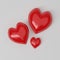 Valentine`s day concept. Three Red hearts on white background.