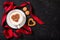 Valentine`s day. Cup of cappuccino coffee with heart on foam