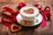 Valentine`s day. Cup of cappuccino coffee with heart on foam