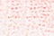 Valentine`s day decorative soft blur abstract pattern of red hearts confetti on white background.