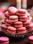 Valentine\\\'s Day dessert idea, delicious pink macarons on a platter, sweet romantic gift