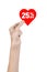 Valentine\'s Day discounts topic: Hand holding a card in the form of a red heart with a discount of 25% on an isolated