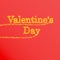 Valentine`s Day. Fiery lettering on a red background