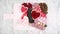 Valentine`s Day flat lay overhead candy and cookies grazing platter stop motion.