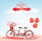 Valentine`s Day holiday background with tandem bicycle with heart shape balloons.