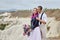 Valentine`s day loving couple in nature hugs and kisses, man and woman love each other. Mountains of Cappadocia in Turkey