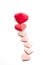 Valentine`s Day Origami Hearts Arranged in Shape on White Background