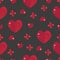 Valentine\\\'s day pattern of red small and large hearts and flowers on a dark background