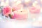 Valentine\'s Day. Pink heart shaped candles and roses