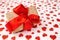 Valentine`s Day. Presented as a red ribbon on a white paper with red hearts