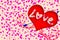 Valentine`s Day. red heart with an cupid arrow. Love. Confetti from hearts.
