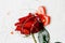 Valentine`s Day. Red rose on the table and in the weight. heart and wine plugs. world in weight.